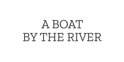 a-boat-by-the-river